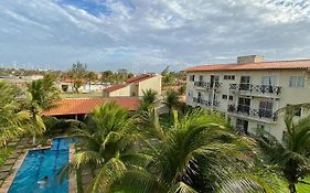 Apartamento com vista para o mar, piscina , deck , playground e estacionamento .